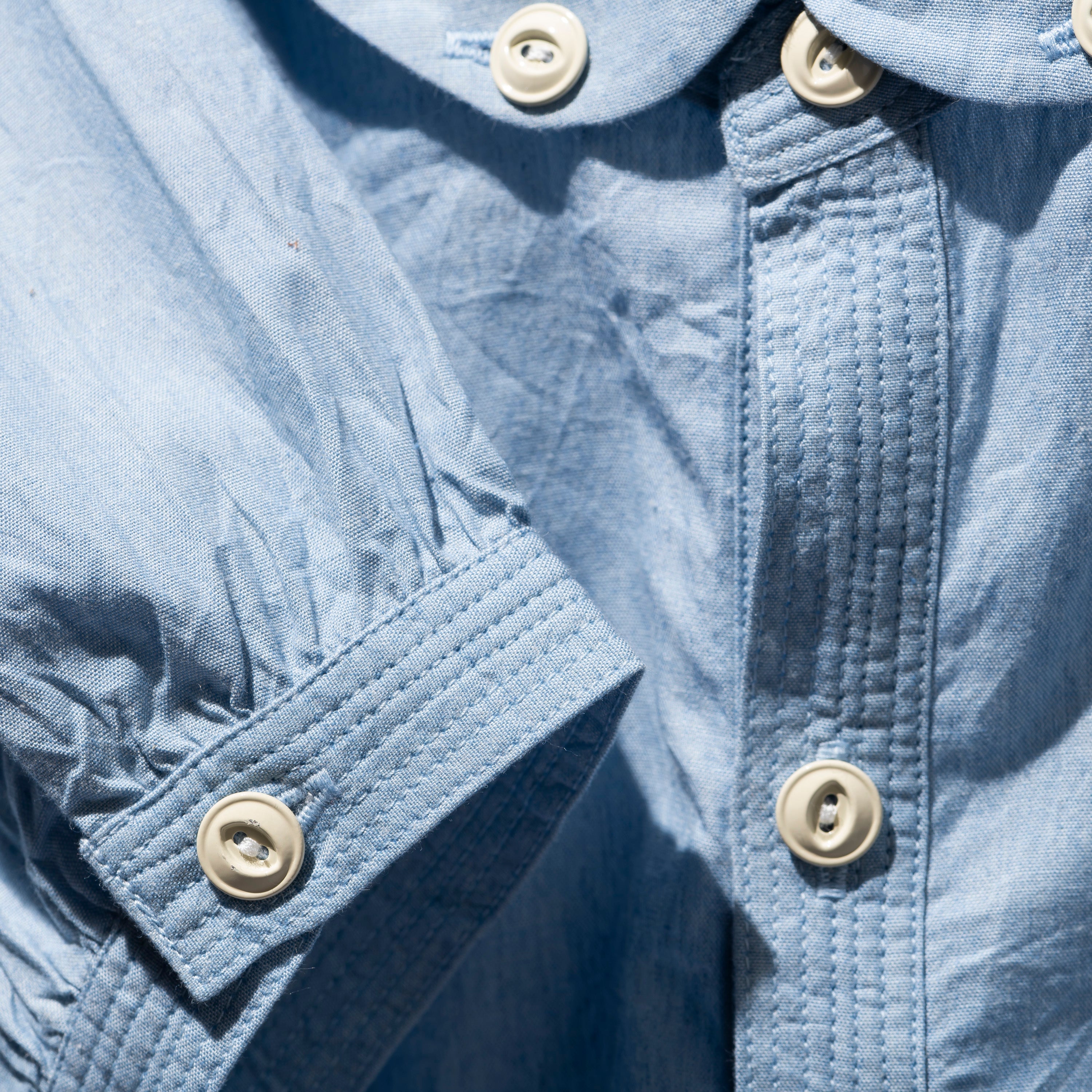 MULTI-POCKET SAX BLUE SHIRT – WORDS, SOUNDS, COLORS & SHAPES